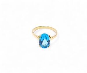 bague topaze bleue ovale monture or chaton 4 griffes