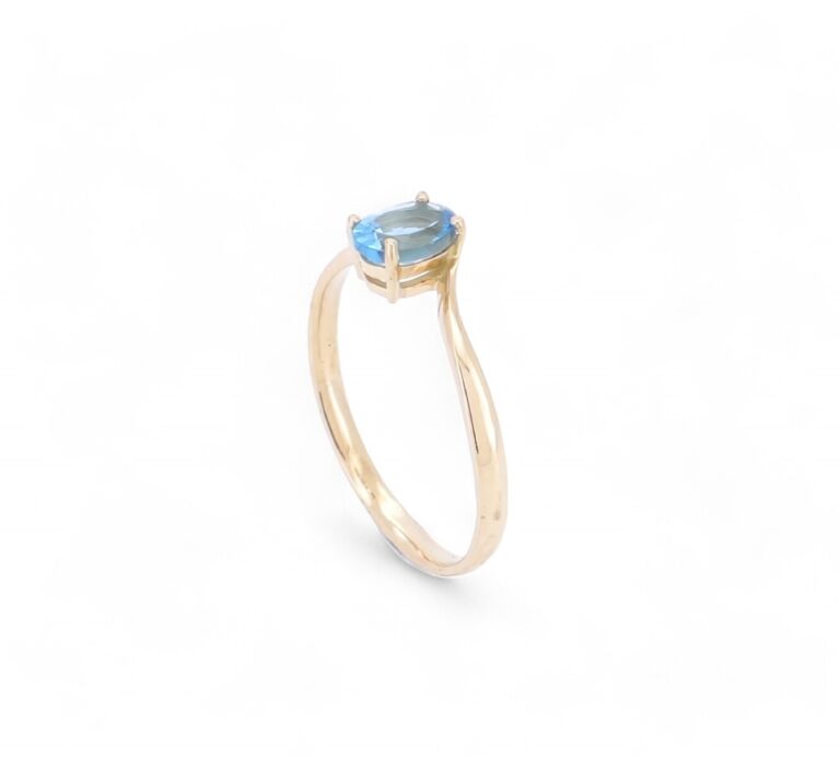 bague topaze bleue ovale monture or jaune