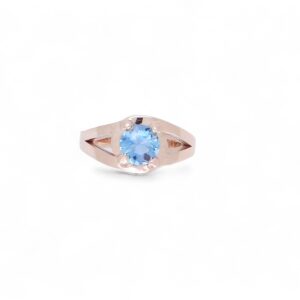 solitaire or rose 18 carats avec au centre un zircon bleu