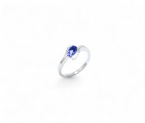 saphir ceylan ovale 7/5 mm serti sur bague en or blanc semi clos