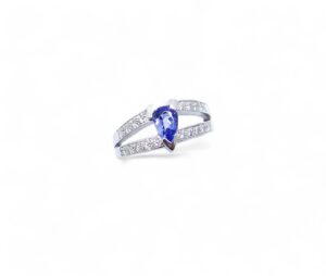 bague or blanc 18 carats rhodié diamants et tanzanite poire serti sur trois griffes